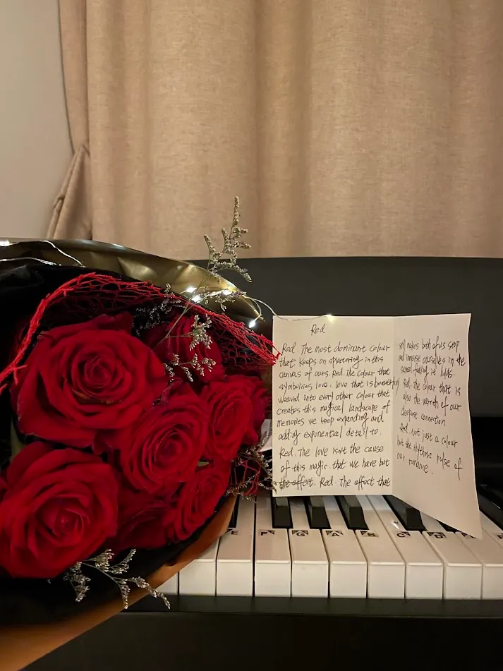 An amazing dinner where I first got to express my creativity with love. I prepared flowers and a letter, and we basked in each other's affection as we read it.